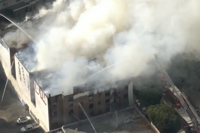 'Famous Morrison Hotel Building in Downtown L.A., Immortalized by Doors Album, Damaged by Fire'